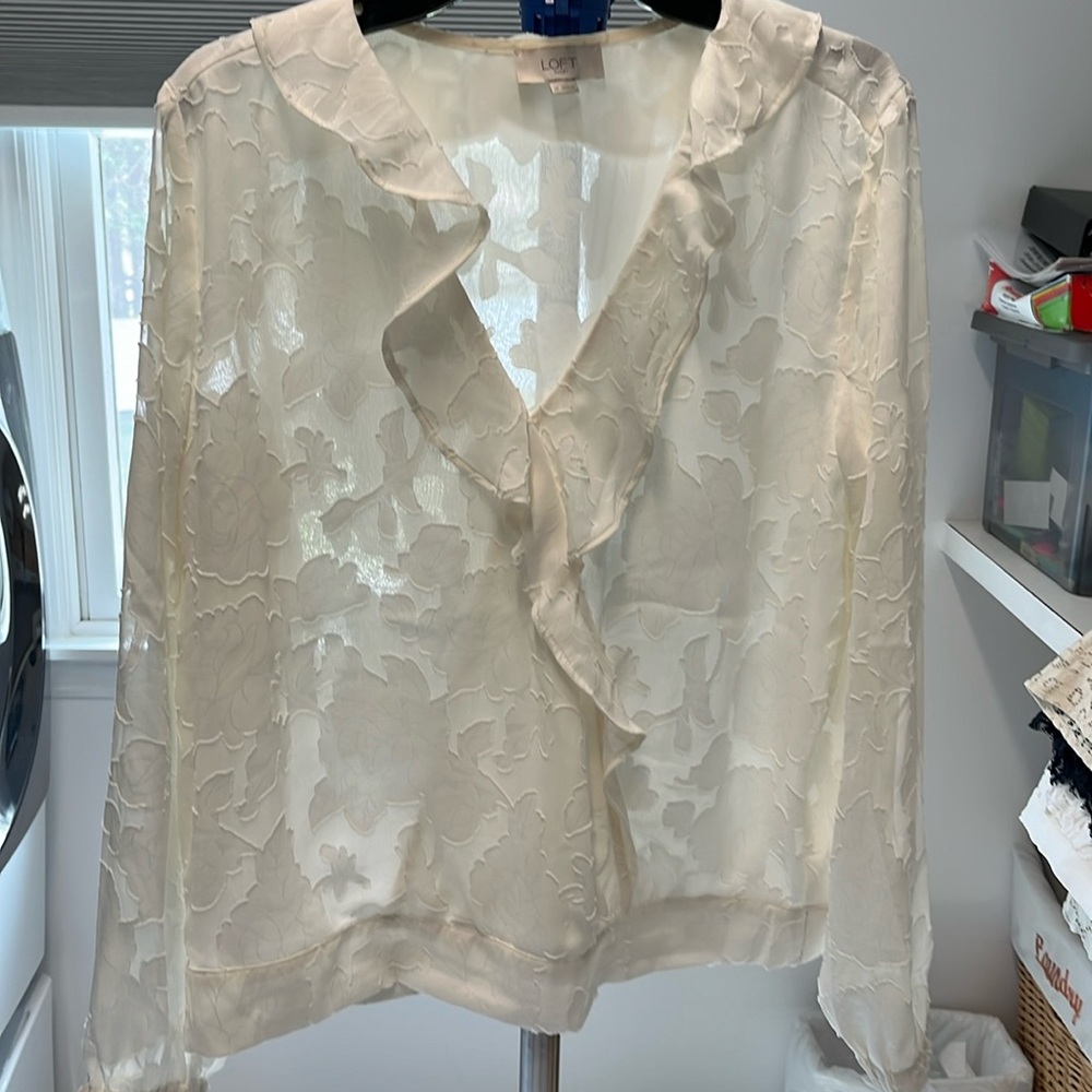 Loft cream color off white blouse with flowers.  Size medium